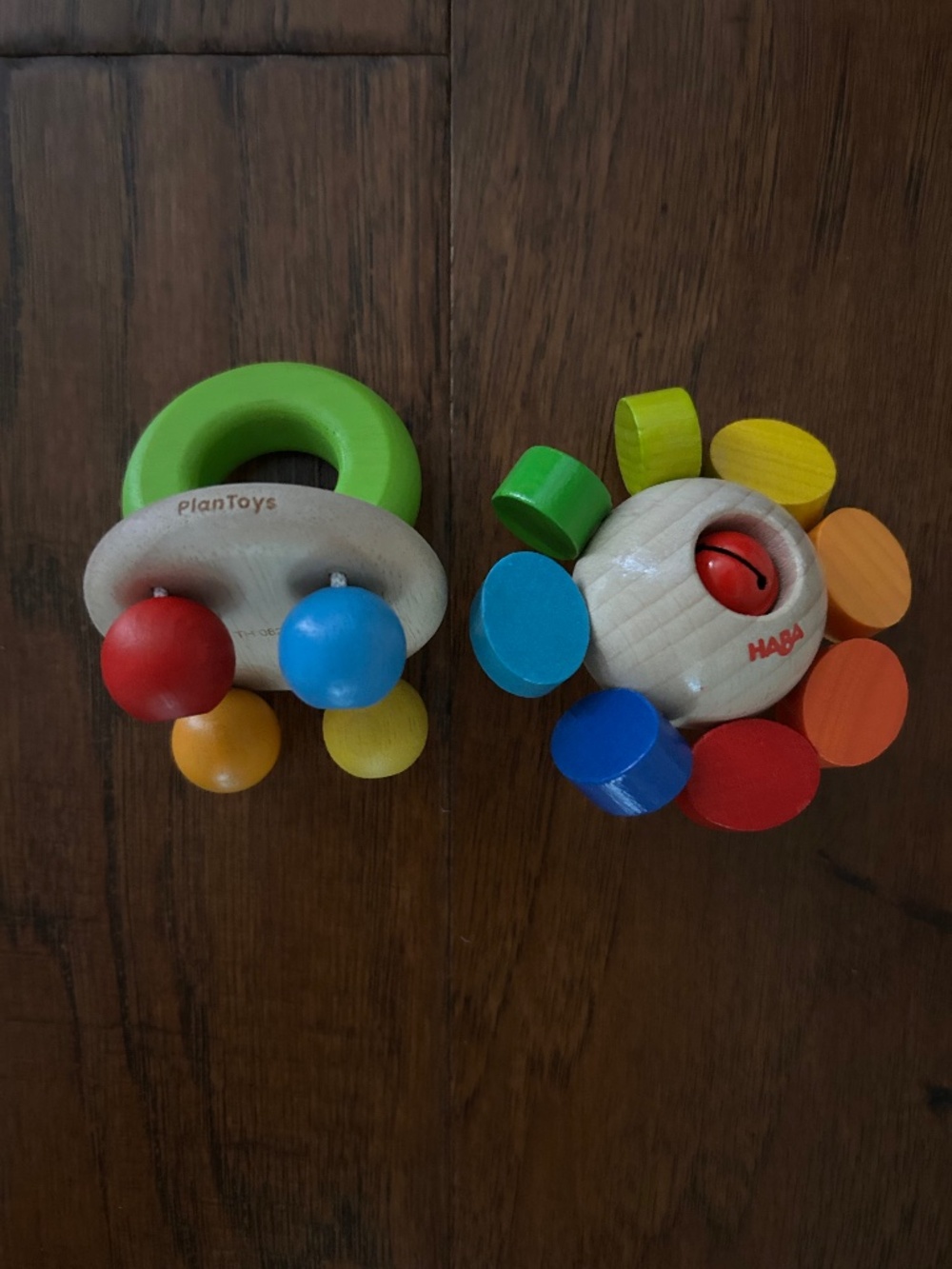 Plan Toys and Haba wooden baby rattles